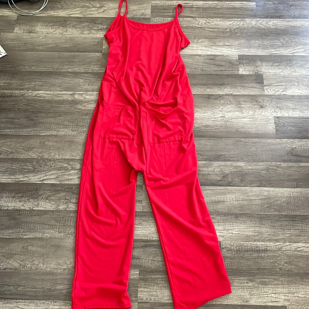 Soft material jump suit/ new condition